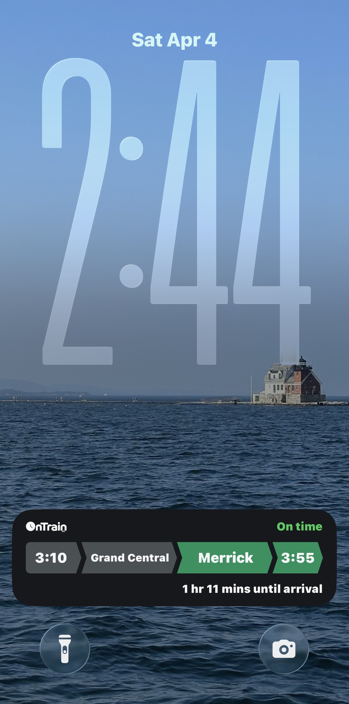 OnTrain Live Activity on iPhone lock screen showing trip to Merrick